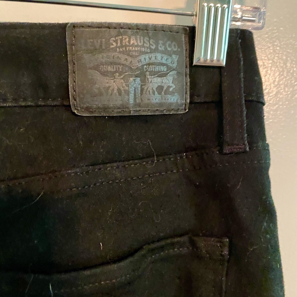 Levi's high rise super skinny black jeans Sz 31